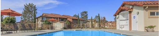 a large swimming pool with houses in the background at Riverview Springs, Oceanside