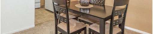 a kitchen and a dining room with a table and chairs at Riverview Springs, California