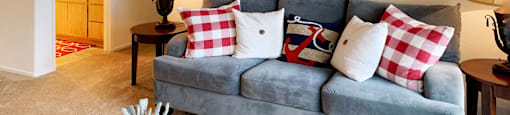 a living room with a couch and a coffee table at Riverview Springs, Oceanside, CA, 92058