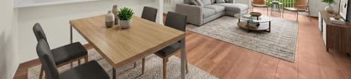 A modern living room with a dining table and chairs.