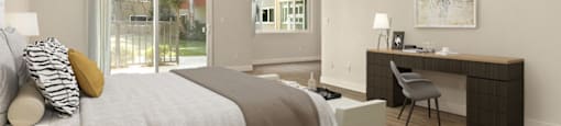Apartments in Encino, CA for Rent - White Oak Terrace - A Spacious Bedroom with Wood-Style Flooring, a Desk with a Chair, and Private Access to the Patio
