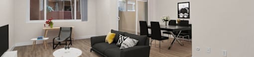 a living room with a couch and a table at Lombardi Apartments, Woodland Hills, CA