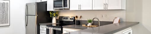 Kitchen at The Reserve at Warner Center Apartments, Woodland Hills, CA 91367
