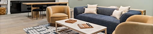 a living room with a couch and a table