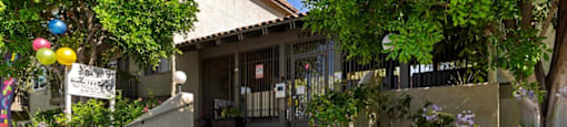 a view of the front of the building from the sidewalk