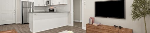 Living Room With TV at Woodland Trio Apartments, California, 91601