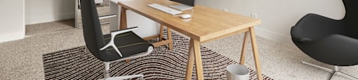 A room with a desk and a chair.