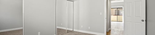 Master Bedroom Sherman Oaks Apartment with Mirrored Closet