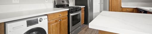 Upgraded Kitchen Appliances, Cabinets, and Countertops