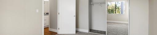 Sherman Oaks Apartments for Rent - Brody Terrace - Bedroom with Plush Carpeting and Mirrored Closet Doors