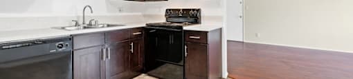 Upgraded kitchen cabinets and countertops at Parthenia Terrace Apartments