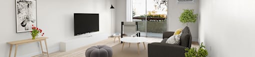 a living room with a couch and a table and a television