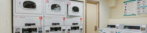 Laundry Room at The Reserve at Warner Center Apartments, California