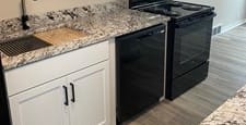 Fully Equipped Kitchen With Modern Appliances at Eton Square Apartments and Townhomes, Birmingham, Michigan