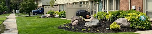 Community Exterior and Green Walkways at Eton Square Apartments and Townhomes, Birmingham, MI, Michigan