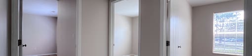 Three open doors in a room with wood flooring.