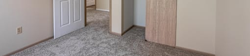 A room with a white door and a brown door. at Highlands of Heritage Woods Apartments, Ohio