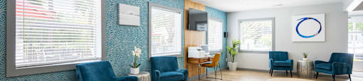 our waiting room is spacious and bright with plenty of seating and a flat screen tv at Nextloft Apartments, Bluffton, 29910