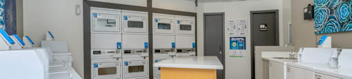 On-site apartment laundry facility at East Phoenix apartment building Ascent 1829