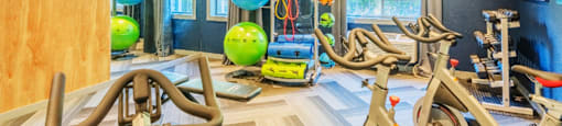 fitness center with weights and cardio equipment at Nextloft, South Carolina, 29910