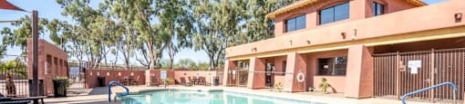 The pool is connected to the clubhouse at Village Greens of Queen Creek