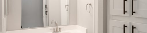 a bathroom with a sink and a mirror at Ascent on Peoria Apartments, Phoenix, 85029