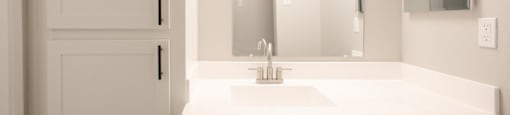 a bathroom with a sink and a mirror  at Ascent on Peoria Apartments, Phoenix, AZ 85029