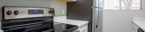 kitchen in Tucson with stainless steel energy appliances at The Vintage Apartments, Tucson, AZ