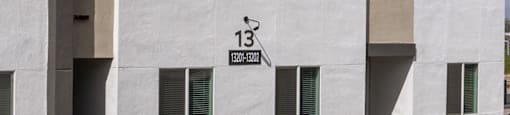 A modern building with the number 13 on it.