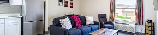 Kitchen and living room at The Vistas Apartments