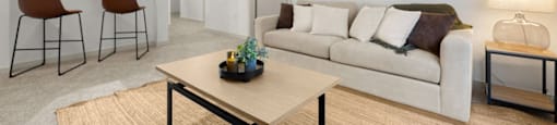 a living room with a couch and a table