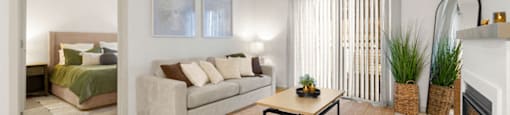a living room with a couch and a coffee table