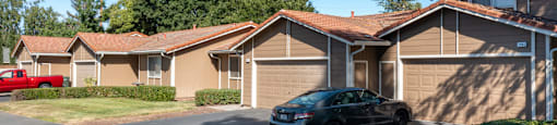 a car parked in front of a row of houses at Oak Grove Terrace, California, Concord, 94518