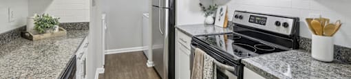 A kitchen with white cabinets and a granite countertop.