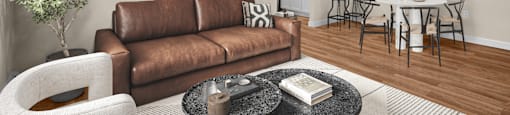 A living room with a brown couch, a coffee table, and a dining area in the background.