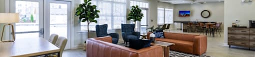 Ashland Farms Resident Clubhouse with Cozy Seating, Large Windows, and Separate TV Room