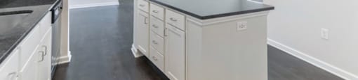 Ashland Farms Unit 2 Kitchen with Open Layout, Island, and Modern Black Light Fixtures