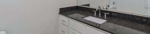 Ashland Farms Bathroom with Granite Counters, Large Single Sink Vanity, and Plenty of Cabinet Storage