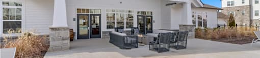Apartments For Rent In Ashland City, TN - Ashland Farms - Fire Pit Outside Community Center with Lounge-Style Patio Furniture