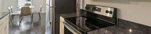 Ashland Farms Kitchen Open to Dining Room with Granite Counters, Full Appliance Package, and Ample Cabinet Storage