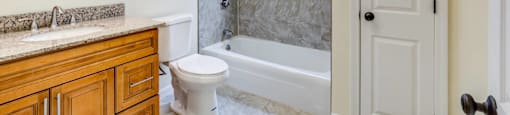 Bathroom with tub/shower and linen closet
