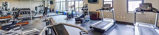 Apartments in Northland, Kansas City MO with In-Unit Washer and Dryer - Zona Rosa - 24-Hour Fitness Center With Treadmills, Elypticals, and Dumbbells