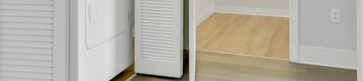 A white refrigerator is in a kitchen with a white door.