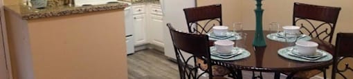 Dining Room and Kitchen View at Citrus Gardens Apartments, Fontana