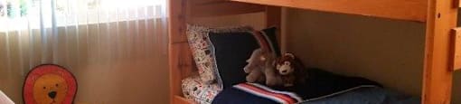 Small Bed Room at Citrus Gardens Apartments, California
