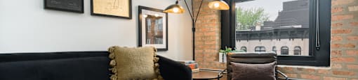 The Duncan beautiful living room furniture with exposed brick wall