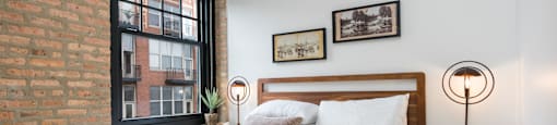 The Duncan spacious bedroom with queen size bed