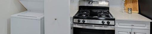 1 BED - 1 BATH | Kitchen/Washer & Dryer at Town Walk at Hamden Hills, Connecticut, 06518