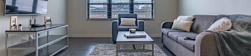 a living room with a couch and a coffee table