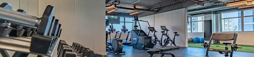 a gym with weights and other exercise equipment